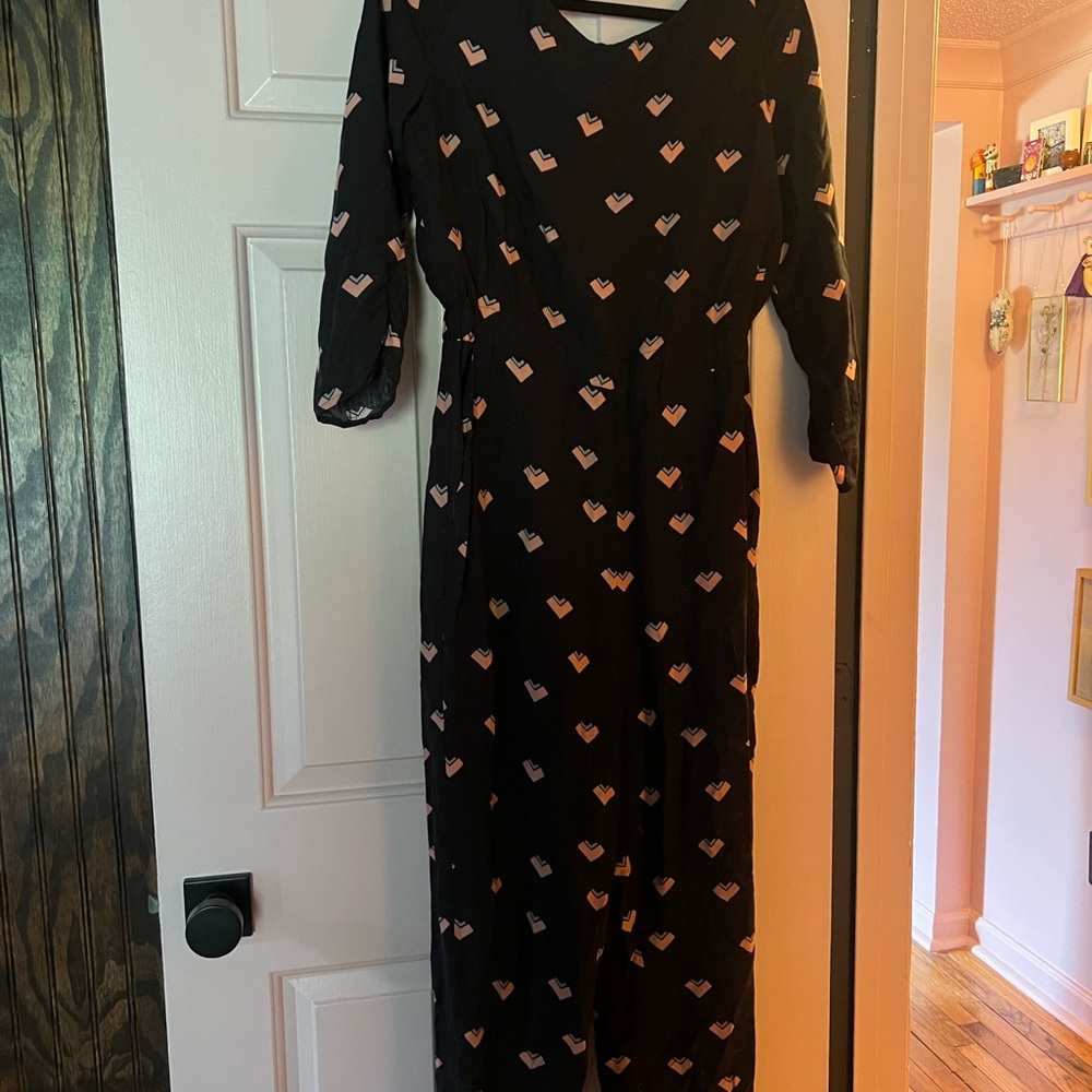 Corey Lynn Calter Black jumpsuit with Pink Accents and slit in back
